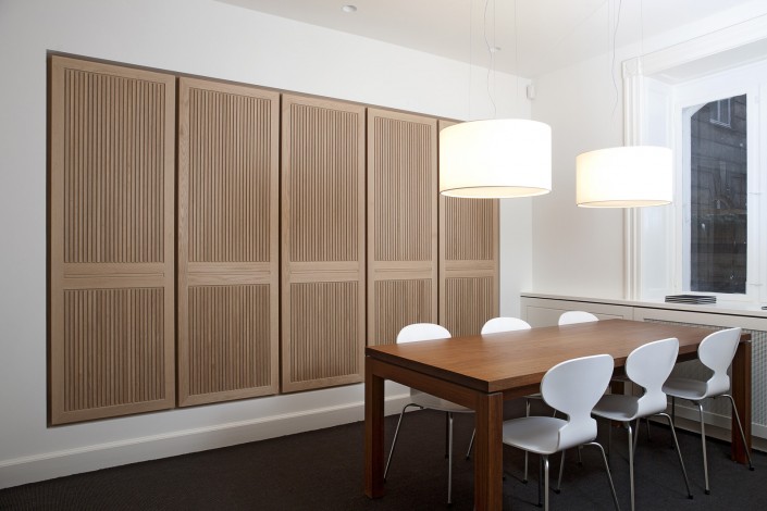 built-in-tall-cabinets-with-slated-wooden-doors